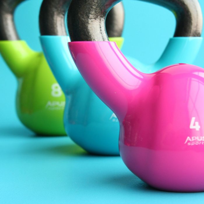 Person doing a home workout with free weights