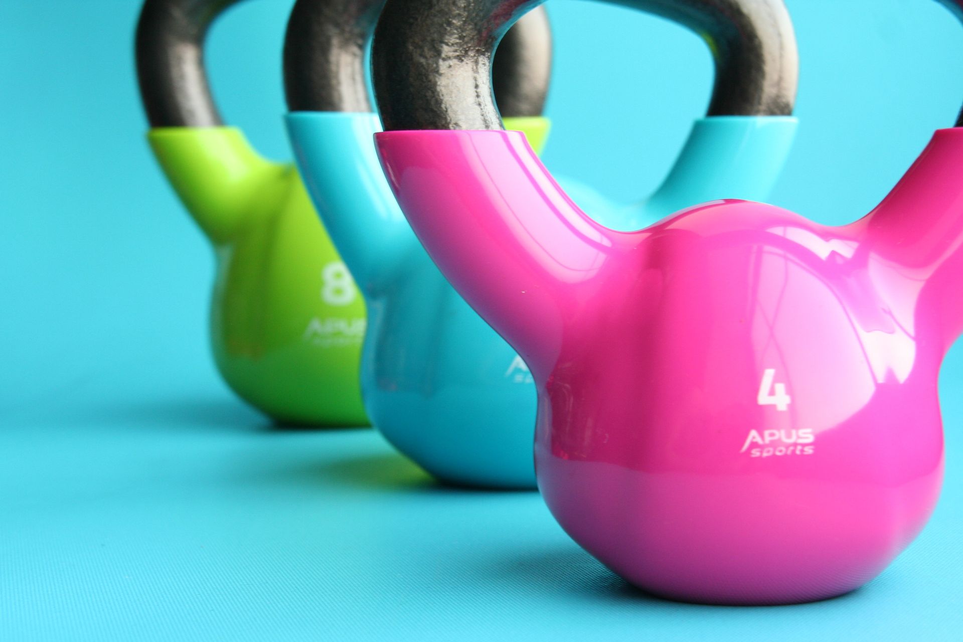 Person doing a home workout with free weights