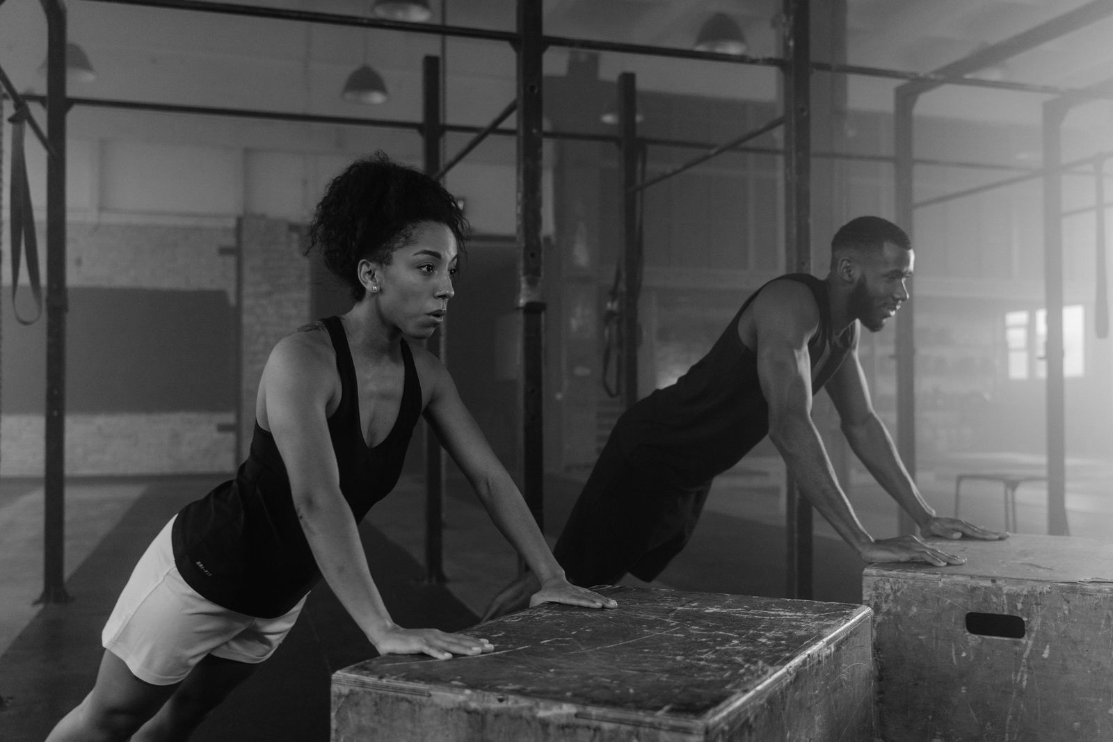 Gym members training and supporting each other